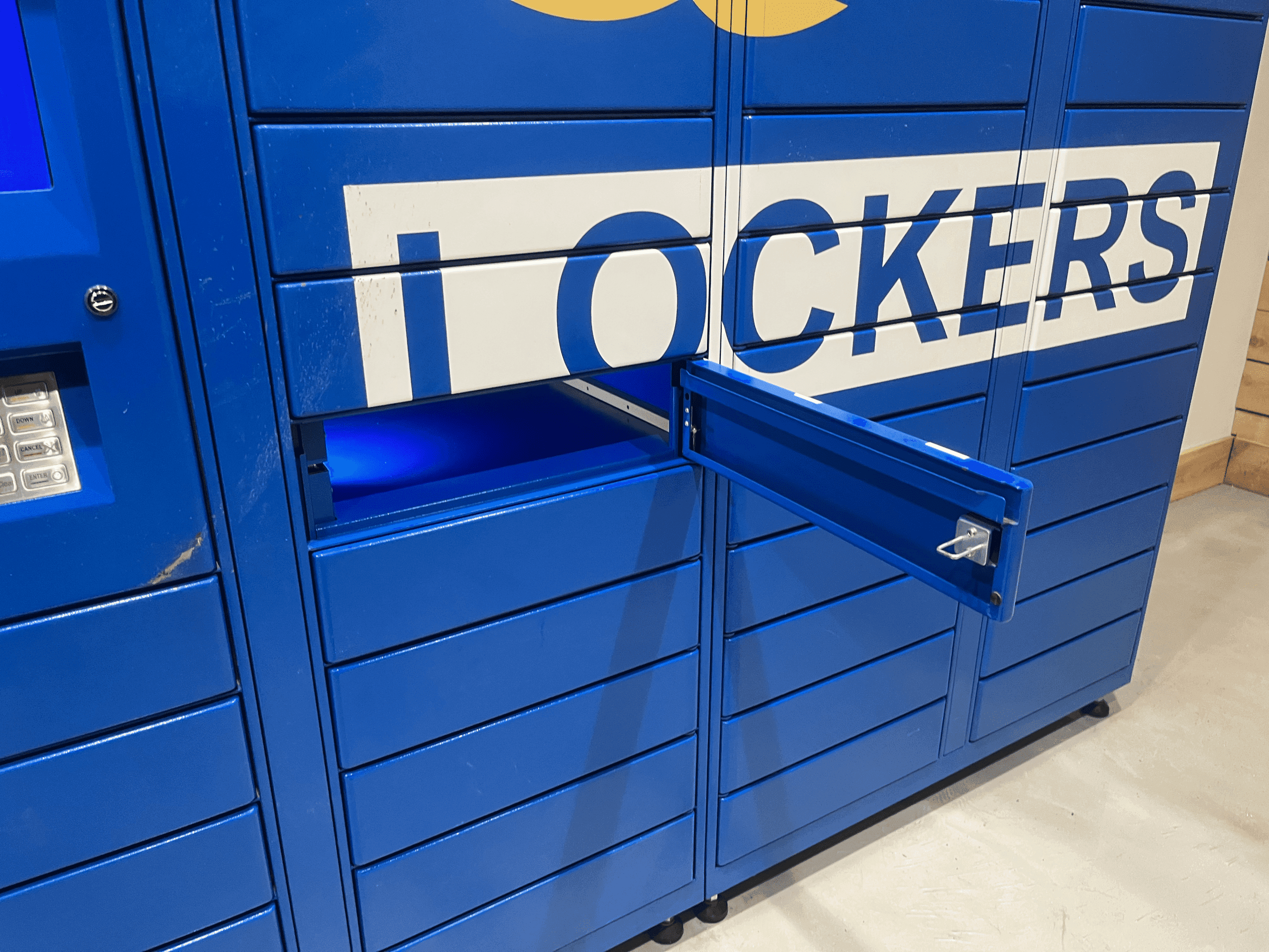 Open On Q locker with items inside