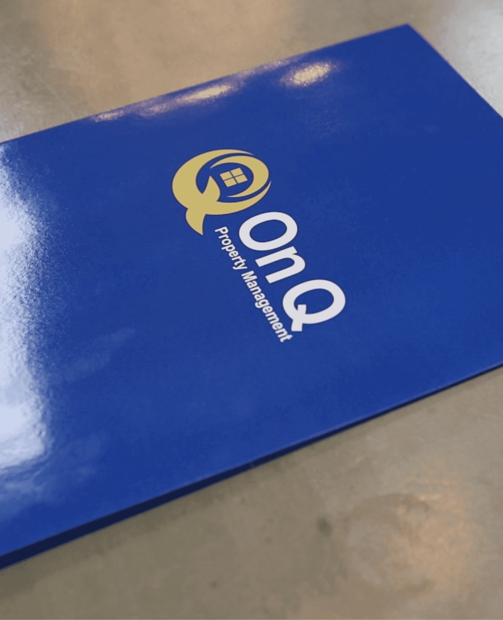 On Q folder graphic